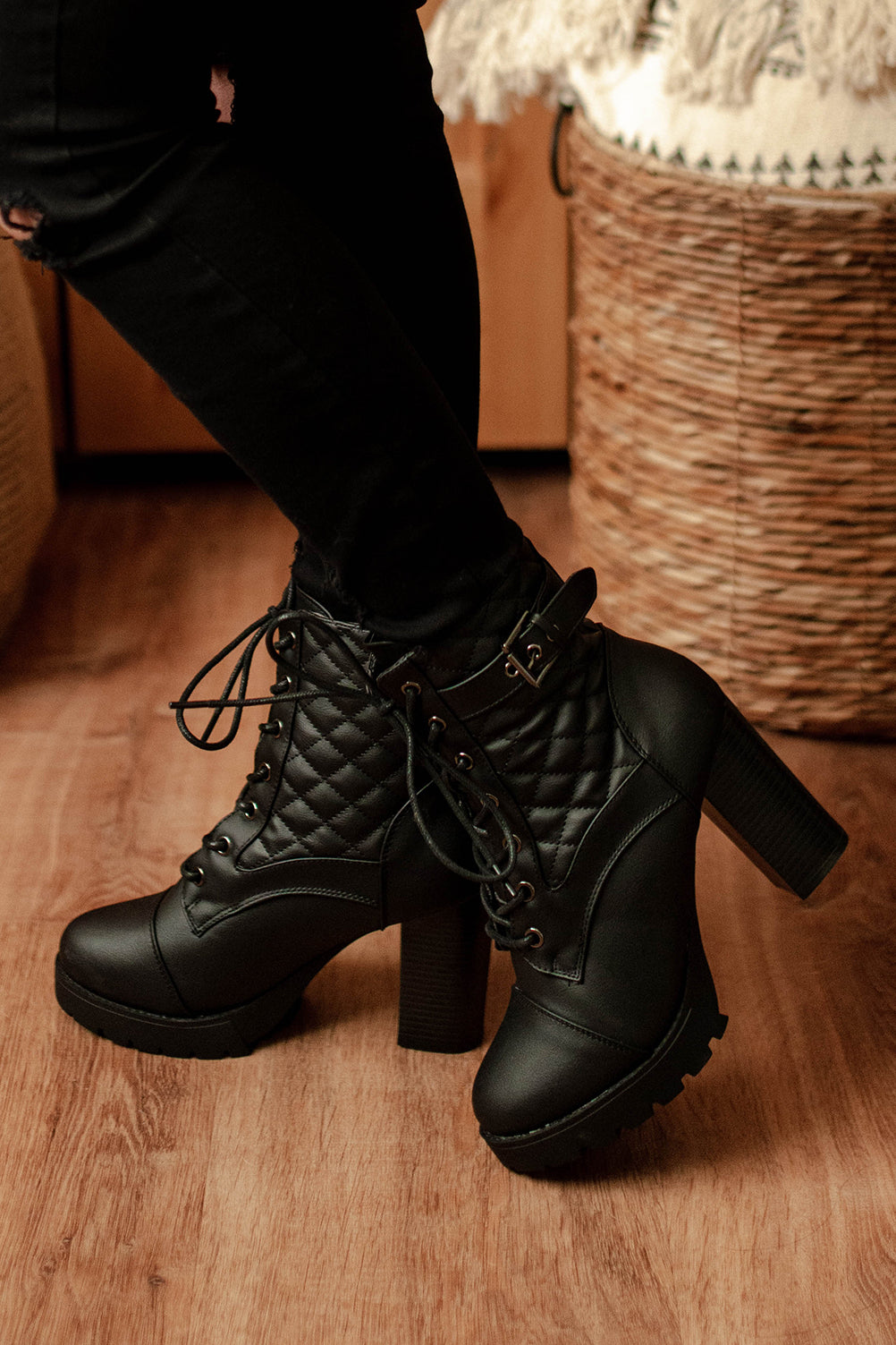 Black high clearance heeled combat boots